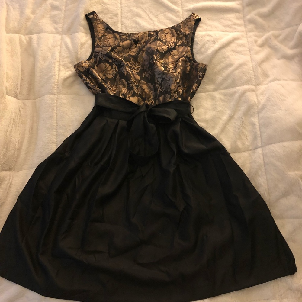 Jessica Howard black and metallic gold dress.
